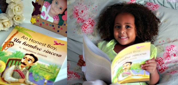biracial baby girl reading hispanic heritage month childrens book on cuban legand jose marti