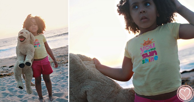 biracial girl at the beach in california