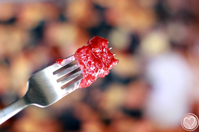 Blueberry Bread Pudding with White Chocolate Chips and Strawberry Sauce, perfect for 4th of July desserts
