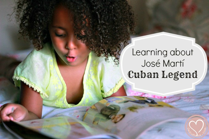 biracial baby girl reading hispanic heritage month cuban book