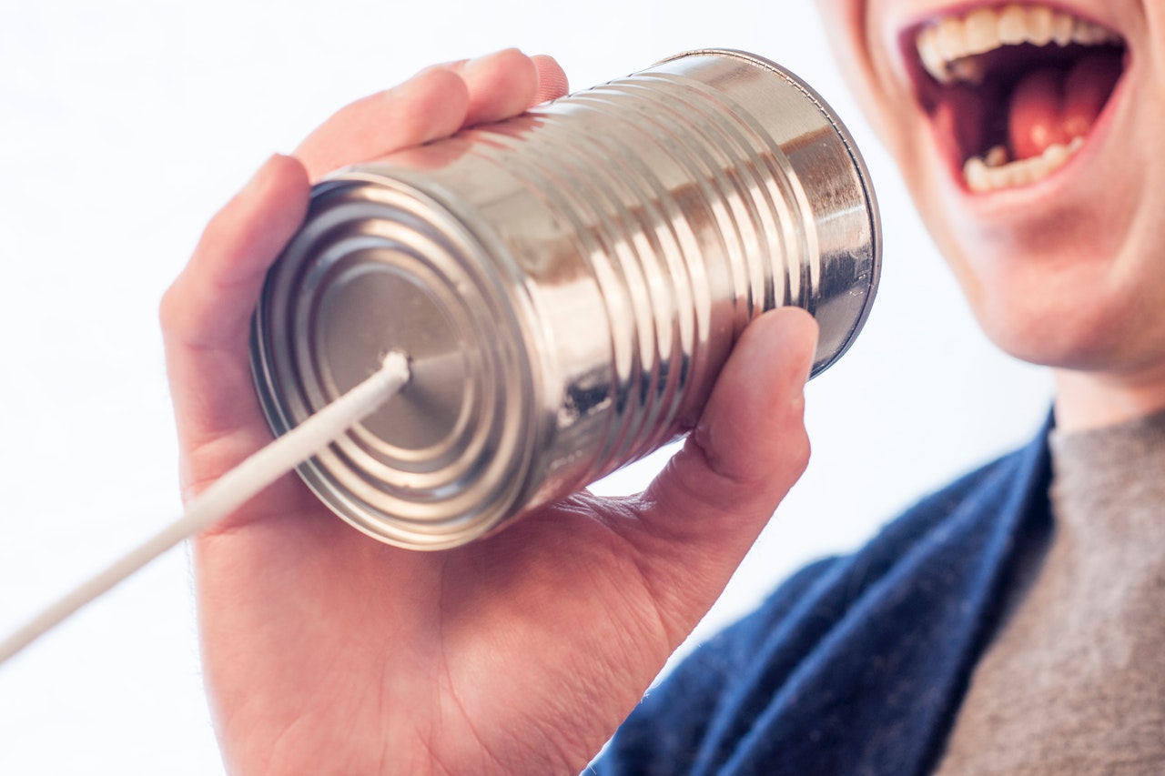 qualities of a good listener, tin can listening game